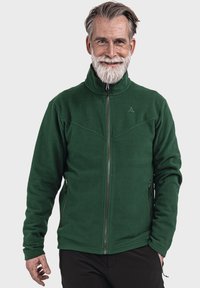 Grüne, Reißverschluss-Fleecejacke mit hohem Kragen, zwei seitlichen Taschen, taillierter Passform und dezenten Nähdetails.