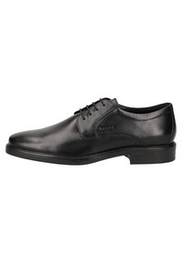 Chaussure habillée en cuir noir avec une finition lisse, à lacets, bout rond et une semelle en caoutchouc robuste. Détails de couture subtils sur le côté.