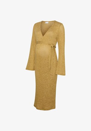Zwangerschapsjurk in mosterdgeel ribstof, met een V-hals, lange uitlopende mouwen en een strik tailleontwerp. Middelmatige lengte tot halverwege het scheenbeen.