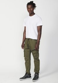 Koroshi JOGGER  - Donji dijelovi trenirke - verde   green
