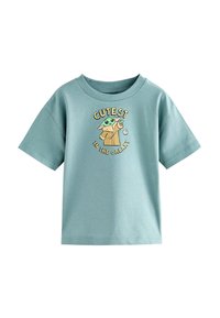 Himmelblaues T-Shirt mit kurzen Ärmeln aus weicher Baumwolle, mit einem grafischen Druck eines Charakters und dem Text "SÜßESTE IM UNIVERSUM."