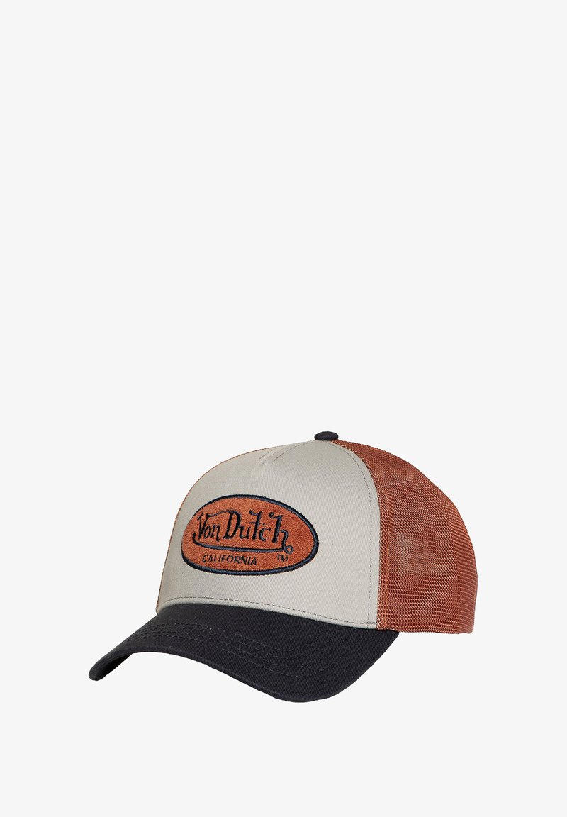 Gorra de béisbol con una parte delantera beige, paneles laterales de malla marrón y un visera negra. Cuenta con un logo bordado en un parche circular.