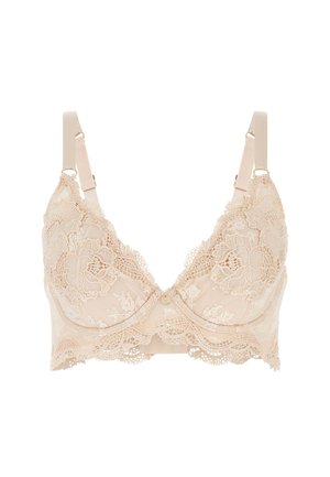 Kant beha in lichtbeige, met bloemenpatronen, een V-hals ontwerp, verstelbare bandjes en een klein knoopdetail in het midden.