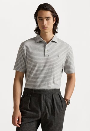 - Koszulka polo