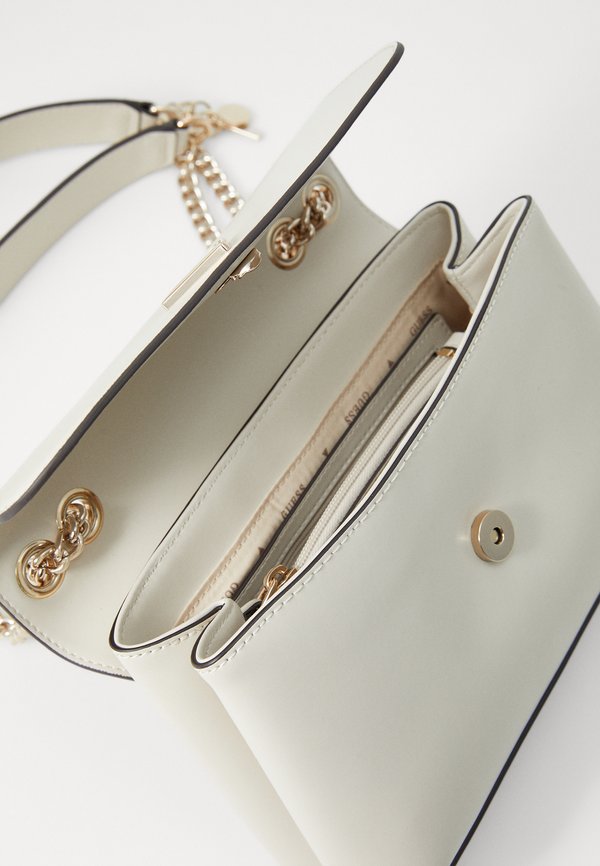 DARYNA CONVERTIBLE FLAP - Cross body bag - bone4