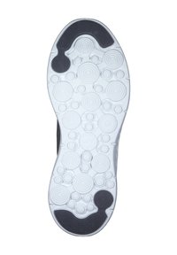 Skosula med cirkulära texturerade mönster i vitt, med svarta gummigrepp på hälen, tån och bågarna för grepp.