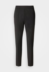 Pantalon noir slim-fit avec ceinture élastique et plis avant, présenté sur un fond blanc uni.