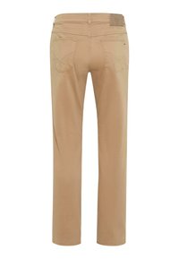 Beige Hosen mit geradem Bein, ausgestattet mit zwei Gesäßtaschen und einem dezenten gestickten Muster. Weicher Stoff mit glatter Textur.