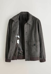 Men's brown and gray checkered jacket with buttoned front pocket, open front showing smooth dark brown inner lining and brand label.
