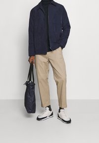 Pier One Stickad tröja - mottled dark blue