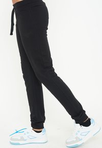LEGEA Trainingsbroek - nero