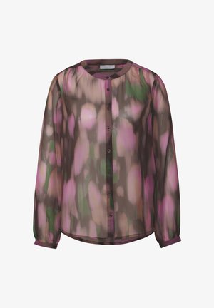 Blusa trasparente marrone, con un colorato motivo floreale in tonalità di rosa e verde, scollo rotondo e chiusura con bottoni davanti. Maniche lunghe con polsini.