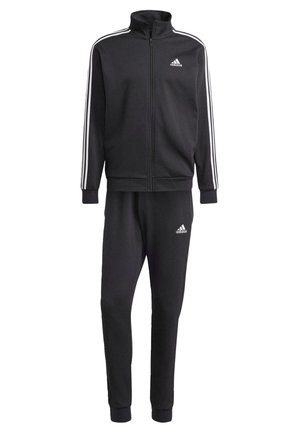 Survêtement Adidas noir en tissu doux, comprenant une veste zippée avec des rayures blanches aux épaules et un pantalon assorti avec des poignets et un logo.