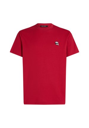 Rode katoenen T-shirt met korte mouwen, met een kleine geborduurde afbeelding van een gezicht met een zonnebril op de linkerborst.