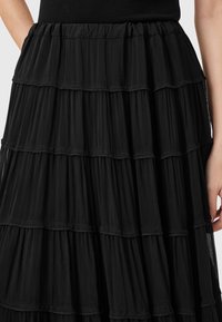 AllSaints EVA - Gonna a campana - black