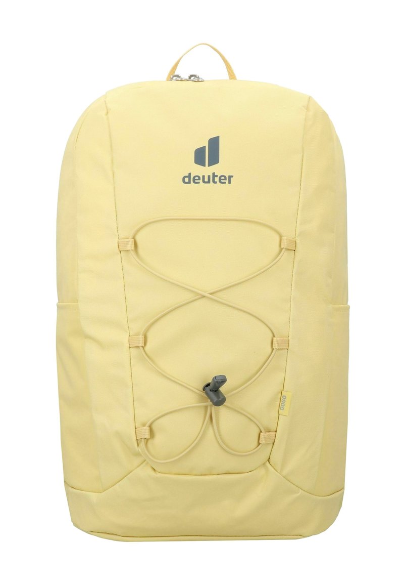 Gelbe Rucksack aus strapazierfähigem Material, mit einem vorderen Bungee-Seilsystem, Logo und Seitentaschen. Glatte Textur und minimalistisches Design.