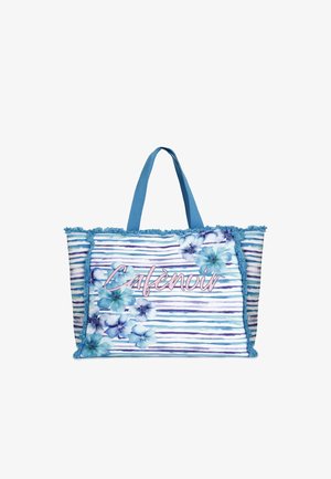 Stor stof indkøbstaske med blå stropper, prydet med et blomsterdesign på hvid og blå stribet baggrund. Udsmykket med frynse detaljer.