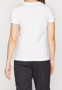 Puma Triko s potiskem - white