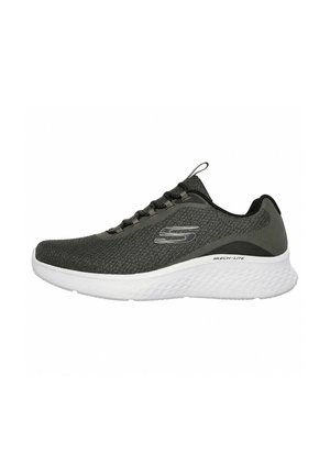 Zapatilla deportiva Skechers de color gris oscuro con suela blanca texturizada y cierre de cordones, vista de lado sobre un fondo blanco.