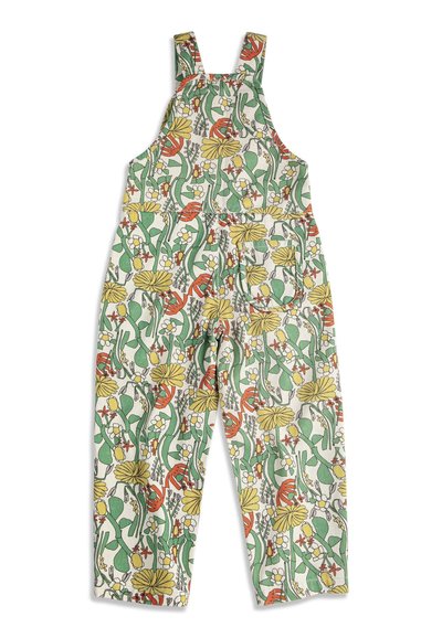 Salopette sans manches pour enfants à imprimé floral avec des fleurs vertes, jaunes, orange et blanches, et une petite poche frontale sur un pantalon à jambes larges.
