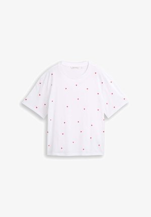 T-shirt bianca a maniche corte con piccoli motivi a cuore rossi sparsi, scollo rotondo e vestibilità comoda.