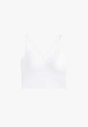 Fehér, rövidített bralette, vékony, keresztbe futó pántokkal és sima, rugalmas anyaggal. V-alakú nyakkivágása és minimalista dizájnja van.