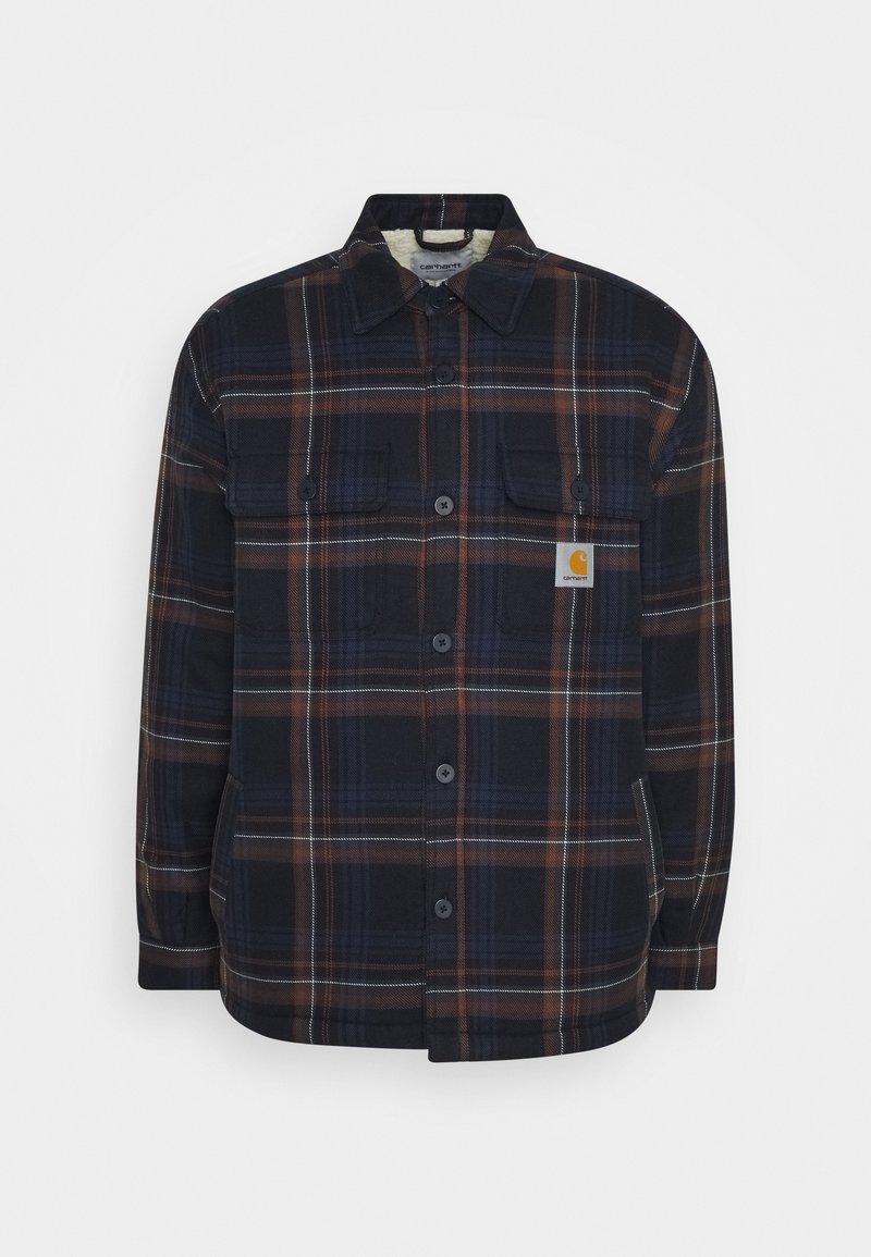Mörk rutmönstrad skjortjacka med två bröstfickor och Carhartt-logotyp på vänstra fickan, med marinblå, brun och vita ränder.