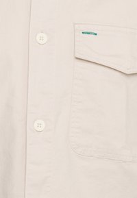 Tommy Hilfiger Übergangsjacke - white