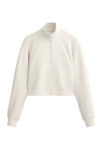 Cropped white zip-up jacket made from ribbed fabric, with a high collar and raglan sleeves, featuring a flat texture and side pockets.