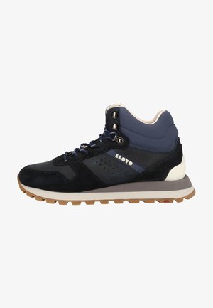 Navy and black high-top sneaker featuring suede and textile materials, two-tone design, perforated side, and rubber outsole with brown tread.