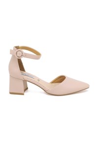 Décolleté color beige a punta con tacco a blocco, cinturino alla caviglia regolabile, materiale sintetico liscia e soletta leggermente testurizzata.