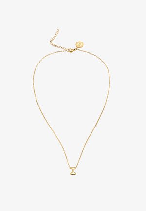 Nježna ogrlica od zlatnog lanca s malim, glatkim privjeskom u obliku slova T i podesivim kopčom s okruglom oznakom s logotipom.
