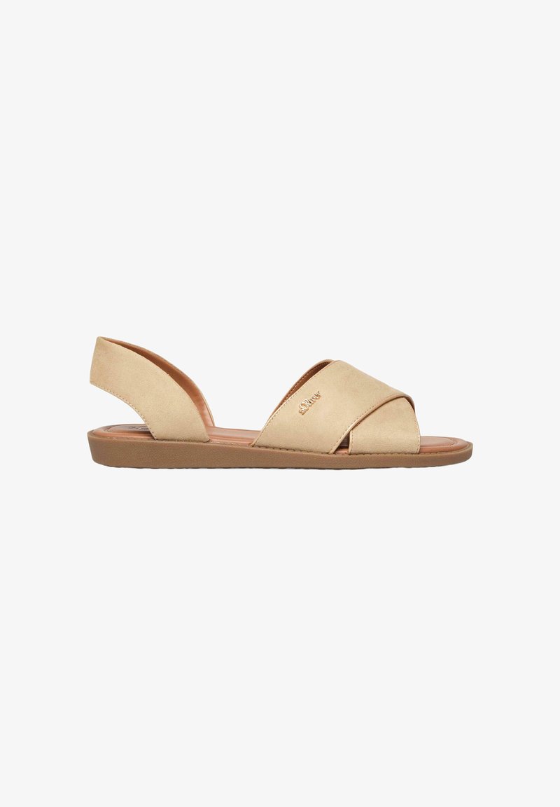 Sandale plate beige avec des brides croisées à l'avant, bout ouvert, bride arrière au talon et semelle basse rembourrée.