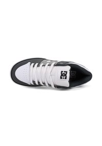 DC shoes with a white leather upper, grey accents, and perforated toe. Features white laces and a padded black interior. Flat rubber sole.