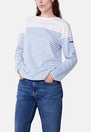 Long-sleeve crew-neck top in white with blue horizontal stripes. Features relaxed fit, soft cotton material, and logo detail on sleeve.