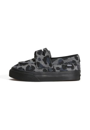 Niedriger Vans Slip-On-Schuh mit schwarzem und grauem Leopardenmuster aus Stoff und schwarzer Gummisohle auf weißem Hintergrund.