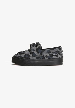 Niedriger Vans Slip-On-Schuh mit schwarzem und grauem Leopardenmuster aus Stoff und schwarzer Gummisohle auf weißem Hintergrund.