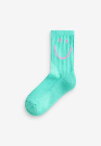 Türkise Socke mit gerippter Textur, die ein pinkes Smiley-Gesicht auf der Oberseite zeigt. Glatte Oberfläche, normale Crew-Länge.