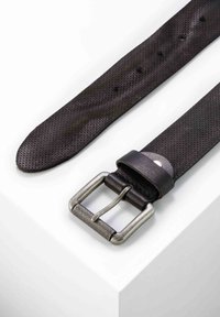 Black woven fabric belt with a textured pattern, a silver metal buckle with knurling, and leather trim near the buckle.