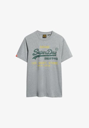 Szara bawełniana koszulka z krótkim rękawem i okrągłym dekoltem, z zielono-żółtym nadrukiem tekstowym "Vintage SuperDry" oraz logo.