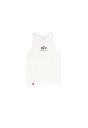 Fehér ujjatlan top, pamutból készült. Fekete nyomtatott logóval rendelkezik, szárnyakkal. Az alján egy kis piros címke található.