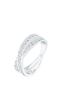 Sølvring med et bølget design, der har en række klare cubic zirconia sten indlagt langs midten. Mærket 925 for sterlingsølv.