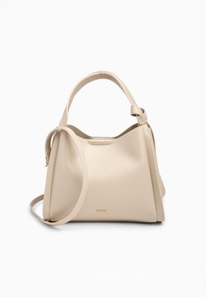 Beige leather handbag with dual handles and a detachable shoulder strap, featuring a small gold logo on the front.