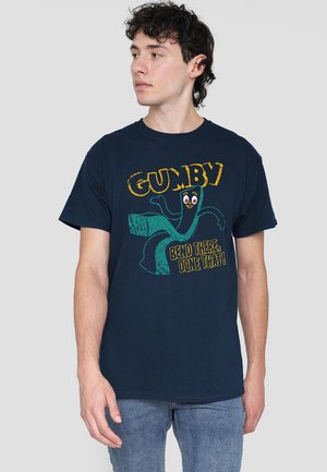 Navy blue cotton t-shirt featuring a graphic of Gumby with the text "GUMBY BEND THERE, DONE THAT!" in yellow and green. Short sleeves, standard fit.