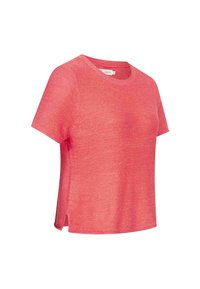 Tričko s krátkým rukávem a kulatým výstřihem v jasné korálové barvě. Vyrobeno z texturované tkaniny s bočními rozparky pro prodyšnost. Minimalistický design, bez vzorů.