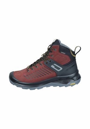 Red and black mid-cut hiking boots with a suede upper, rubber toe cap, mesh accents, and Vibram sole. Features reinforced eyelets and textile laces.