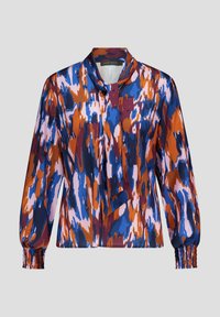 Kleurrijke, geprinte blouse in tinten oranje, blauw en roze. Heeft een kraag, een knoopsluiting en verzamelde manchetten voor een ontspannen fit.