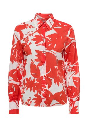 Chemise à manches longues boutonnée avec un grand imprimé floral rouge et blanc, col pointu et poignets boutonnés.