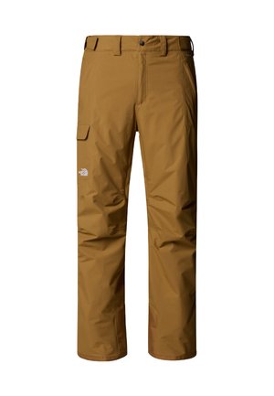 Los pantalones impermeables marrones cuentan con un diseño de pierna recta, bolsillos laterales y un bolsillo tipo cargo. Tejido texturizado con dobladillos reforzados. Logo en el muslo.