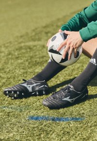 MORELIA NEO IV PRO - Nogometne kopačke za čvrstu podlogu - black/galaxy silver/black